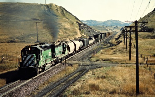 Westbound Burlington Northern Railroad freight train in Hoppers, Montana, on October 3, 1984. Photograph by John F. Bjorklund, © 2015, Center for Railroad Photography and Art. Bjorklund-13-03-16