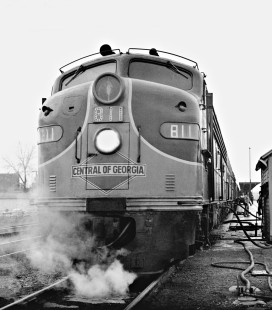 Illinois Central Railroad northbound <i>Seminole</i> passenger train at the station in Champaign, Illinois, in 1959. Leading the train is Central of Georgia diesel locomotive no. 811, painted in Illinois Central colors. Photograph by J. Parker Lamb, © 2015, Center for Railroad Photography and Art. Lamb-01-033-06