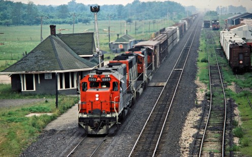 Eastbound Canadian National Railway freight train in Watford, Ontario, on July 3, 1982. Photograph by John F. Bjorklund, © 2015, Center for Railroad Photography and Art. Bjorklund-21-10-20