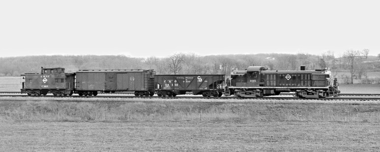 Southbound Erie Railroad two-car local freight train approaches Fairborn, Ohio, behind Alco diesel locomotive no. 1015 in April 1956. Photograph by J. Parker Lamb, © 2015, Center for Railroad Photography and Art. Lamb-01-007-06