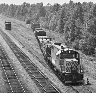 Norfolk Southern Railway local crew picks up boxcars at yard in Aberdeen, North Carolina, in July 1964, beside Seaboard Air Line Railroad main line. Photograph by J. Parker Lamb, © 2016, Center for Railroad Photography and Art. Lamb-01-088-05