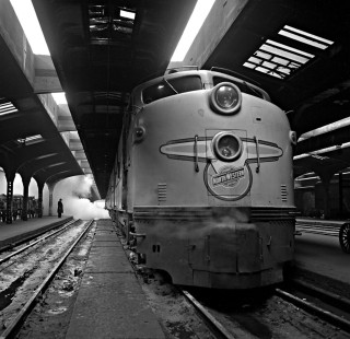 One of Chicago & North Western’s E7A diesel-electric locomotives leads train no. 28, the eastbound <i>San Francisco Overland</i>, which has just arrived at the North Western Terminal in Chicago on November 2, 1951. Photograph by Wallace W. Abbey, © 2015, Center for Railroad Photography and Art. Abbey-01-077-04