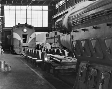 Seaboard Air Line Railroad's high-bay shop in Hamlet, North Carolina,  includes extra EMD engine and components, along with FT no. 4015 and E4 in August 1961. Photograph by J. Parker Lamb, © 2016, Center for Railroad Photography and Art. Lamb-01-077-11