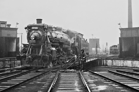 Rain blankets Canadian Pacific Railway Pacific steam locomotive no. 2235 as it is rotated at the Lambton roundhouse in Toronto, Ontario, on July 4, 1958. Photograph by J. Parker Lamb, © 2015, Center for Railroad Photography and Art. Lamb-01-060-02