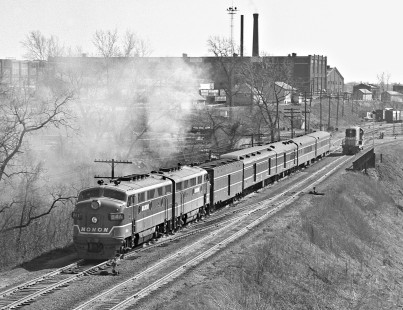 Monon Railroad northbound <i>Thoroughbred</i> passenger train passing the railroad's shops as it departs Lafayette, Indiana, on May 31, 1960. Photograph by J. Parker Lamb, © 2015, Center for Railroad Photography and Art. Lamb-01-044-09
