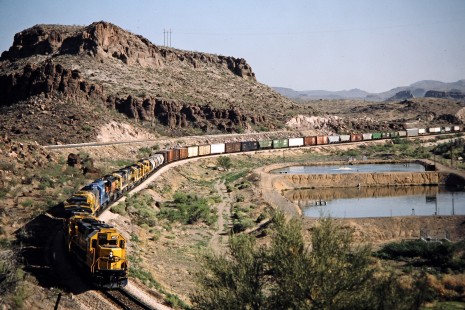 Santa Fe Railway freight train in Harris, Arizona, on June 2, 1990.     Photograph by John F. Bjorklund, © 2015, Center for Railroad Photography and Art. Bjorklund-05-22-01