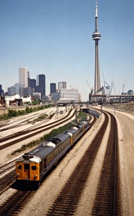 Westbound VIA Rail passenger train on the Canadian National Railway in Toronto, Ontario, on May 27, 1988. Photograph by John F. Bjorklund, © 2015, Center for Railroad Photography and Art. Bjorklund-22-25-20