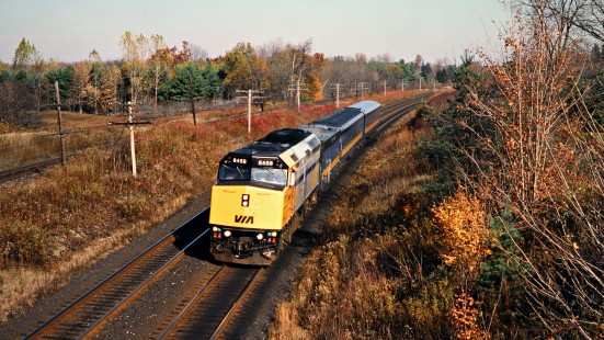 Westbound VIA Rail passenger train on the Canadian National Railway in Komoka, Ontario, on October 23, 1993. Photograph by John F. Bjorklund, © 2015, Center for Railroad Photography and Art. Bjorklund-23-05-21