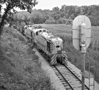 Peabody Short Line Alcos lug mine cut to East St. Louis interchange in June 1959. Photograph by J. Parker Lamb, © 2015, Center for Railroad Photography and Art. Lamb-01-063-06
