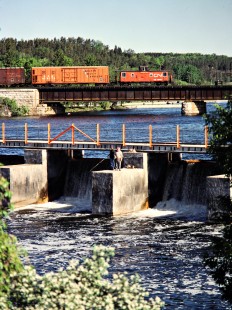 Westbound Canadian National Railway freight train crossing the Trent River in Trenton, Ontario, on May 26, 1980. Photograph by John F. Bjorklund, © 2015, Center for Railroad Photography and Art. Bjorklund-21-06-26