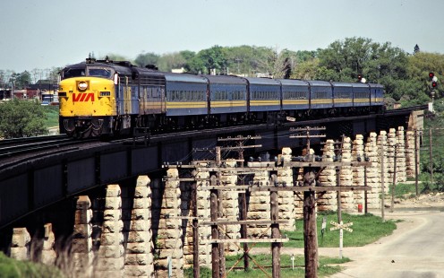 Westbound VIA Rail passenger train on the Canadian National Railway in Port Hope, Ontario, on May 26, 1980. Photograph by John F. Bjorklund, © 2015, Center for Railroad Photography and Art. Bjorklund-21-06-08