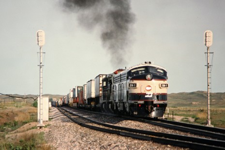 Westbound Burlington Northern Railroad freight train in Natick, Nebraska, on June 4, 1992. Photograph by John F. Bjorklund, © 2015, Center for Railroad Photography and Art. Bjorklund-14-17-15