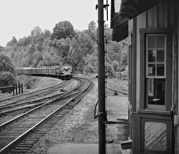 Eastbound Norfolk and Western Railway <i>Pocahontas</i> passenger train speeds past station at Blue Ridge, Virginia, behind Richmond, Fredericksburg and Potomac Railroad units in June 1962. Photograph by J. Parker Lamb, © 2016, Center for Railroad Photography and Art. Lamb-01-091-11
