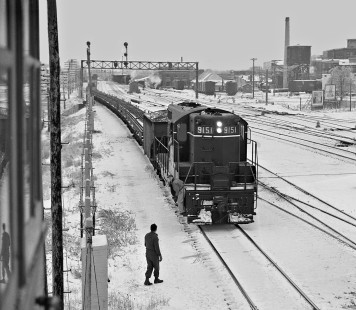 Illinois Central Railroad northbound work train carrying welded rail approaching the tower at Champaign, Illinois, on January 23, 1959. Photograph by J. Parker Lamb, © 2015, Center for Railroad Photography and Art. Lamb-01-032-10
