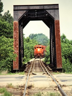 Southbound Ann Arbor Railroad freight train at Raisin River in Dundee, Michigan, on June 21, 1981. Photograph by John F. Bjorklund, © 2015, Center for Railroad Photography and Art. Bjorklund-02-07-01