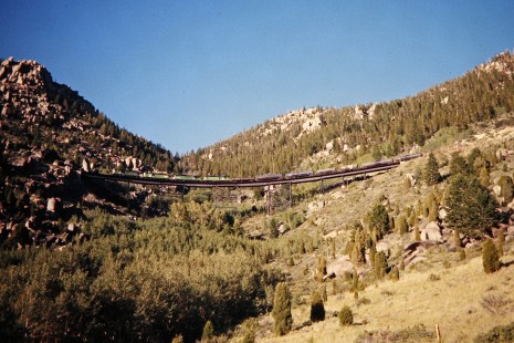 Westbound Burlington Northern Railroad freight train on Homestake Pass east of Butte, Montana, on July 8, 1973. Photograph by John F. Bjorklund, © 2015, Center for Railroad Photography and Art. Bjorklund-07-27-01