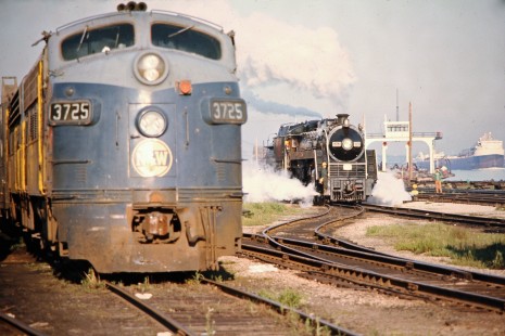 Canadian National Railway no. 6060 and Norfolk and Western no. 3725 in Windsor, Ontario, on May 27, 1974. Photograph by John F. Bjorklund, © 2015, Center for Railroad Photography and Art. Bjorklund-19-27-17