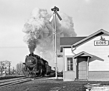 Southbound Illinois Central Railroad empties pass the station at Du Bois, Illinois, en route to Orient mine loadout, station does not use official town name, on January 26, 1959 (Note: enlarged loco image). Photograph by J. Parker Lamb, © 2015, Center for Railroad Photography and Art. Lamb-01-029-01