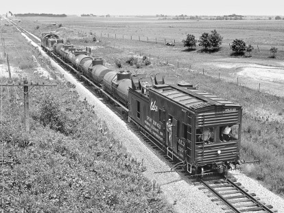 Chicago & Eastern Illinois Railroad southbound weed sprayer train approaching Glover tower near Urbana, Illinois, in August 1959. Photograph by J. Parker Lamb, © 2015, Center for Railroad Photography and Art. Lamb-01-044-03