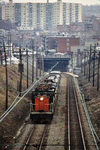 Northbound Canadian National Railway passenger train led by boxcab electric no. 6726 in Portal Heights, Quebec, on April 24, 1980. Photograph by John F. Bjorklund, © 2015, Center for Railroad Photography and Art. Bjorklund-20-24-20
