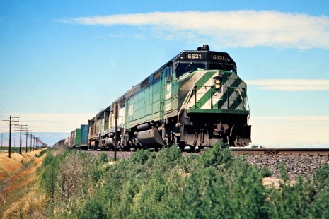 Eastbound Burlington Northern Railroad freight train in Quincy, Washington, on July 19, 1974. Photograph by John F. Bjorklund, © 2015, Center for Railroad Photography and Art. Bjorklund-08-15-17