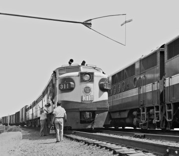 Gale, Illinois, operated hands up box as a rider prepares to board Missouri Pacific Railroad on August 9, 1958. Photograph by J. Parker Lamb, © 2015, Center for Railroad Photography and Art. Lamb-01-061-12