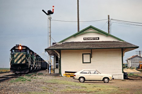 Eastbound Burlington Northern Railroad freight train taking orders in Richardton, North Dakota, on July 9, 1980. Photograph by John F. Bjorklund, © 2015, Center for Railroad Photography and Art. Bjorklund-11-11-19