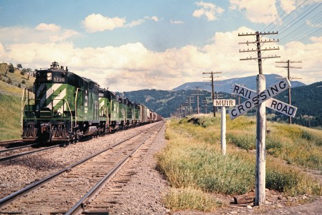 Westbound Burlington Northern Railroad freight train approaching Bozeman Pass in Muir, Montana, on July 8, 1973. Photograph by John F. Bjorklund, © 2015, Center for Railroad Photography and Art. Bjorklund-07-27-12