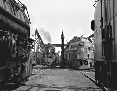 Pennsylvania Railroad and Santa Fe 2-10-4 steam locomotives congregating with F-unit diesels at Columbus, Ohio, in August 1956 showing the changing face of post-World War II railroading on the Pennsy. Photograph by J. Parker Lamb, © 2015, Center for Railroad Photography and Art. Lamb-01-013-01