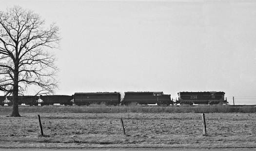 Chicago & Eastern Illinois Railroad northbound freight train behind three models of EMD diesel locomotives near Danville, Illinois, in December 1959. Photograph by J. Parker Lamb, © 2015, Center for Railroad Photography and Art. Lamb-01-043-03
