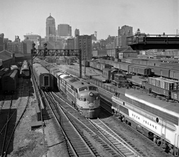 New York Central and Rock Island passenger trains meet just south of Chicago's LaSalle Street Station on August 21, 1950. Photograph by Wallace W. Abbey, © 2015, Center for Railroad Photography and Art. Abbey-01-059-09