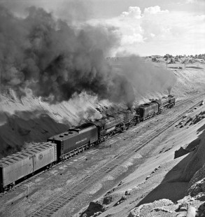An eastbound Union Pacific freight train has just exited one of the Hermosa tunnels on Wyoming’s Sherman Hill on August 17, 1957. Road power is 4-8-8-4 “Big Boy” no. 4019, assisted by 4-8-4 no. 829 as a headend helper for the climb over the Continental Divide. Photograph by Wallace W. Abbey, © 2015, Center for Railroad Photography and Art. Abbey-04-031-10