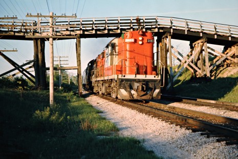 Westbound Canadian National Railway diesel locomotive no. 3151 in Hyde Park, Ontario, on May 26, 1974. Photograph by John F. Bjorklund, © 2015, Center for Railroad Photography and Art. Bjorklund-19-24-06