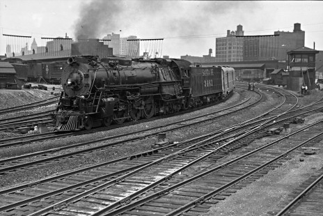 Santa Fe Railway 4-6-4 steam locomotive no. 3461 leads passenger train no. 19, the westbound <i>Chief</i>, around the curve at Clark Street on the way out of Chicago on August 6, 1947. Photograph by Wallace W. Abbey, © 2015, Center for Railroad Photography and Art. Abbey-02-092-01