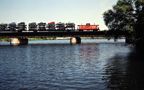 Eastbound Canadian National Railway freight train in Trenton, Ontario, on July 4, 1985. Photograph by John F. Bjorklund, © 2015, Center for Railroad Photography and Art. Bjorklund-21-22-04