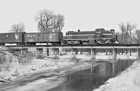 Eastbound Toledo, Peoria and Western Railway local no. 24 crosses frozen creek near Fairbury, Illinois, in February 1960. Photograph by J. Parker Lamb, © 2015, Center for Railroad Photography and Art. Lamb-01-065-03