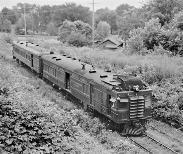Gulf, Mobile and Ohio Railroad local from Bloomington, Illinois, to Kansas City, Missouri, departs Petersburg, Illinois, in June 1959. Photograph by J. Parker Lamb, © 2015, Center for Railroad Photography and Art. Lamb-01-064-08