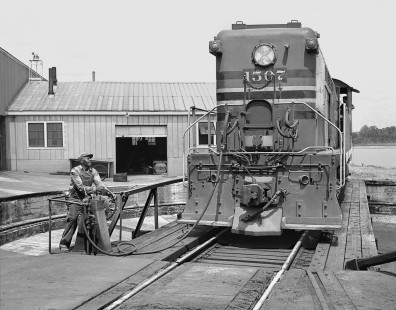 Norfolk Southern Railway hostler uses engine air compressor to spin Baldwin diesel locomotive on turntable at Raleigh, North Carolina, in September 1961. Photograph by J. Parker Lamb, © 2016, Center for Railroad Photography and Art. Lamb-01-087-12