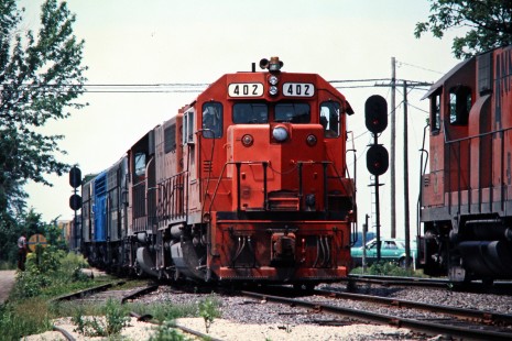 Northbound Ann Arbor Railroad meets southbound Detroit, Toledo and Ironton Railroad in Samaria, Michigan, on June 27, 1976. Photograph by John F. Bjorklund, © 2015, Center for Railroad Photography and Art. Bjorklund-03-20-16