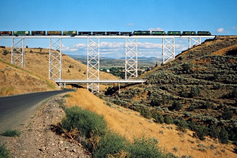 Southbound Burlington Northern Railroad freight train crossing the Willow Creek Trestle in Madras, Oregon, on August 17, 1978. Photograph by John F. Bjorklund, © 2015, Center for Railroad Photography and Art. Bjorklund-10-10-13