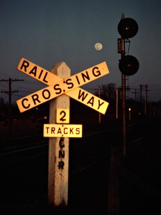Full moon rising on the Canadian National Railway in Komoka, Ontario, on February 27, 1983. Photograph by John F. Bjorklund, © 2015, Center for Railroad Photography and Art. Bjorklund-21-13-25