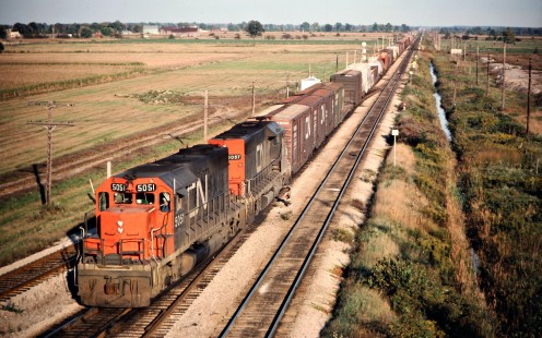 Westbound Canadian National Railway freight train in Sarnia, Ontario, on September 27, 1975. Photograph by John F. Bjorklund, © 2015, Center for Railroad Photography and Art. Bjorklund-20-10-11