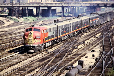 Santa Fe F-unit no. 300 leads an Amtrak passenger train in Chicago, Illinois, on August 18, 1972. Photograph by John F. Bjorklund, © 2015, Center for Railroad Photography and Art. Bjorklund-04-10-19