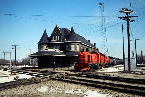Northbound Ann Arbor Railroad freight train crossing the Grand Trunk Western at the depot in Durand, Michigan, on April 10, 1982. Photograph by John F. Bjorklund, © 2015, Center for Railroad Photography and Art. Bjorklund-03-28-02