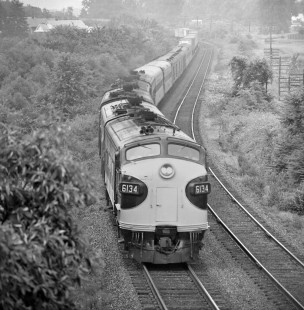 Washington-bound Southern Railway passenger train no. 76 leaves Greensboro, North Carolina, with a cut of TOFC (trailer-on-flatcar) loads in June 1966. Photograph by J. Parker Lamb, © 2016, Center for Railroad Photography and Art. Lamb-01-084-07