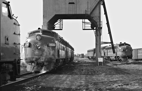 Chicago & Eastern Illinois Railroad diesel locomotives resting beneath a coaling tower, now an obsolete symbol of the steam era, at Danville, Illinois, in November 1959. Photograph by J. Parker Lamb, © 2015, Center for Railroad Photography and Art. Lamb-01-041-01