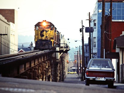 Eastbound Baltimore and Ohio Railroad freight train coming off the Ohio River bridge in Parkersburg, West Virginia, on May 21, 1985. Photograph by John F. Bjorklund, © 2015, Center for Railroad Photography and Art. Bjorklund-17-01-01