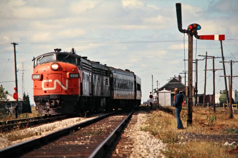 Eastbound Canadian National Railway passenger train led by F-unit diesel no. 6528 in Stony Point, Ontario, on September 22, 1974. Photograph by John F. Bjorklund, © 2015, Center for Railroad Photography and Art. Bjorklund-19-29-19