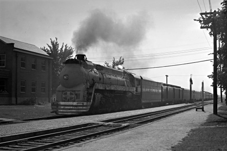 Santa Fe Railway passenger train "Second 24," the second section of the eastbound <i>Grand Canyon Limited</i> behind streamlined 4-6-4 steam locomotive no. 3460, drifts to a stop at Chillicothe, Illinois, on August 3, 1947. Photograph by Wallace W. Abbey, © 2015, Center for Railroad Photography and Art. Abbey-02-091-03