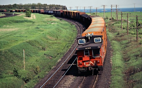 Eastbound Canadian National Railway freight train in Port Darlington, Ontario, on May 26, 1980. Photograph by John F. Bjorklund, © 2015, Center for Railroad Photography and Art. Bjorklund-21-06-04